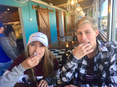 Happy Customers at Hurts Donut in Branson